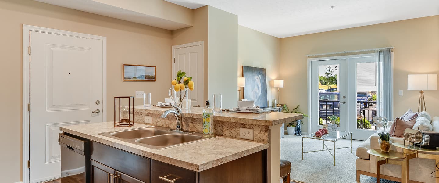 An open kitchen layout complete with updated appliances and modern decor.