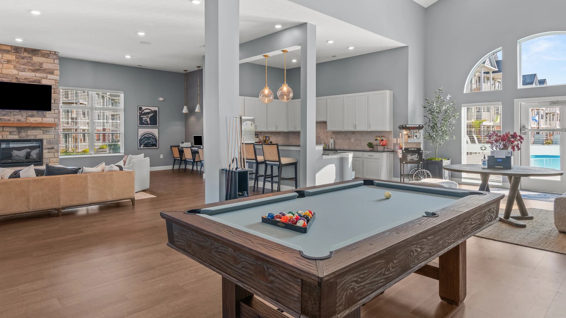 Pool table, lounge, and community kitchen available for residents of an Etna Ohio apartment community