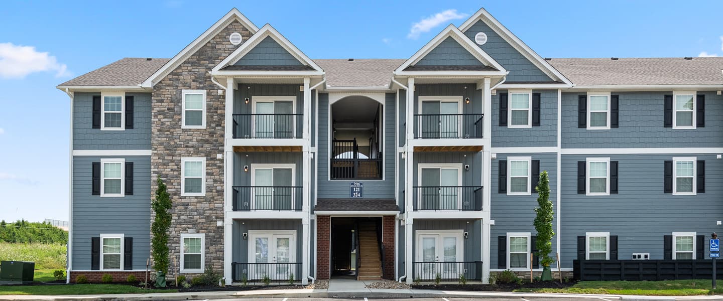 Exterior view of three story apartment complex in Powell, Ohio