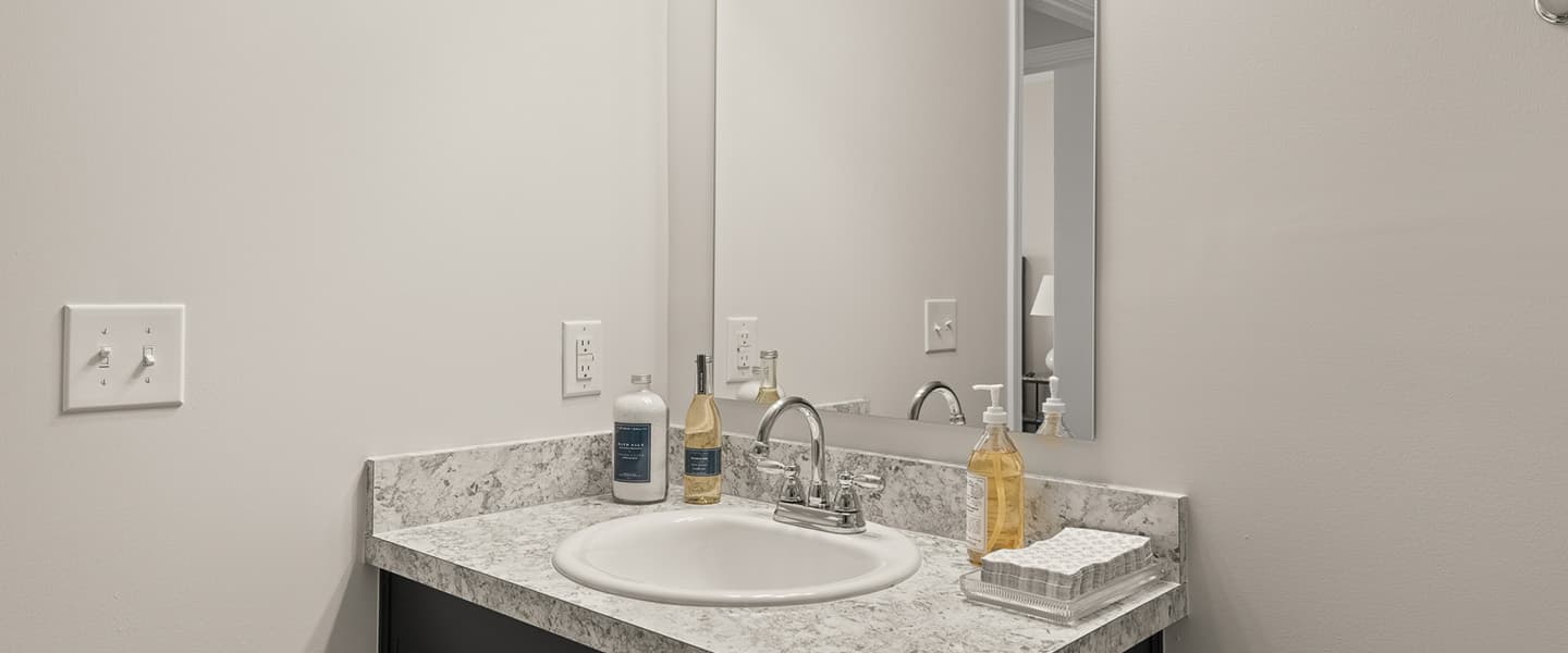 Sink and mirror in a Powell Ohio apartment