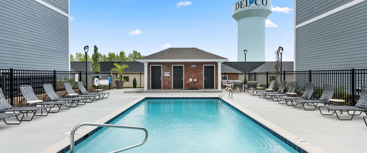 Swimming pool and sundeck attached to a Powell Ohio apartment complex