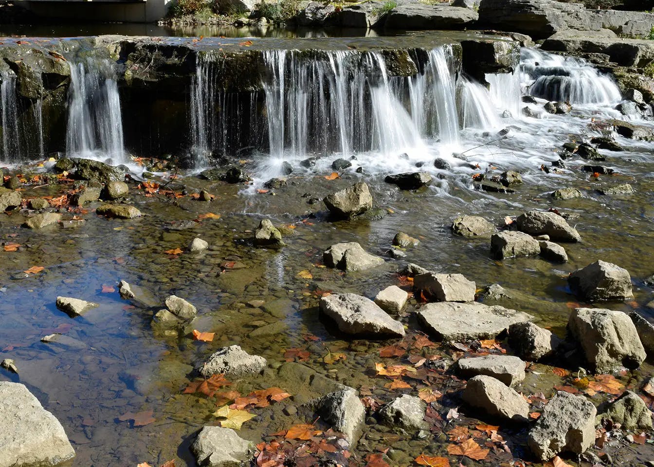A waterfall in the fall season.