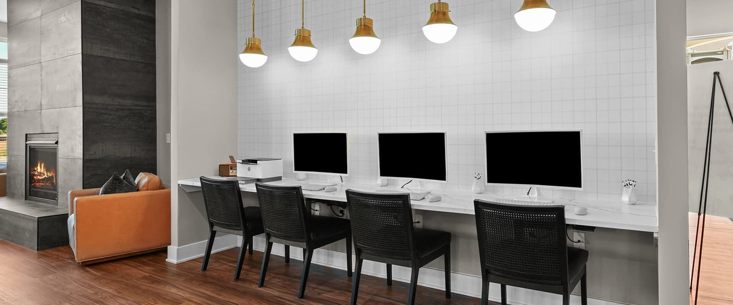 Community area with desks and computers available for resident use