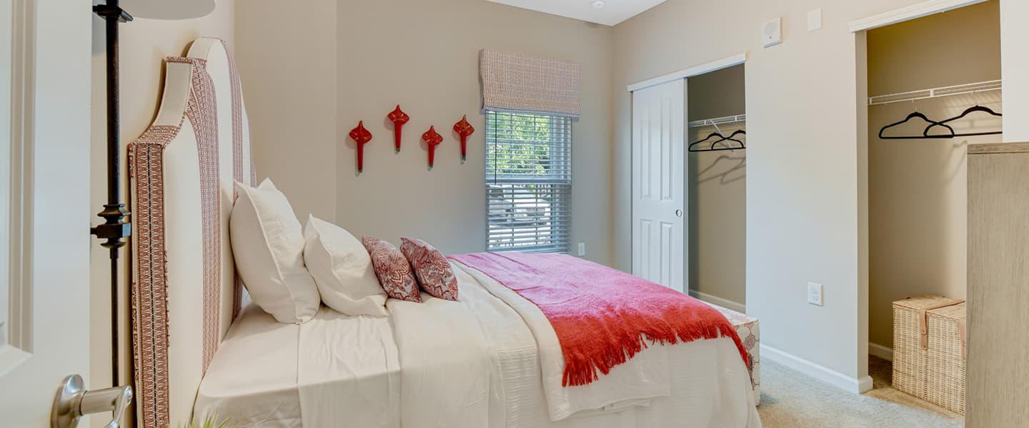 Bedroom with two closets and plenty of space for organization