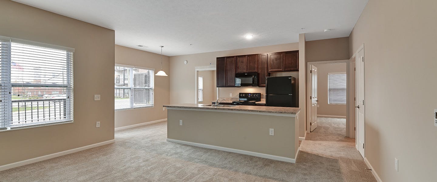 An open kitchen layout complete with updated appliances and modern decor.