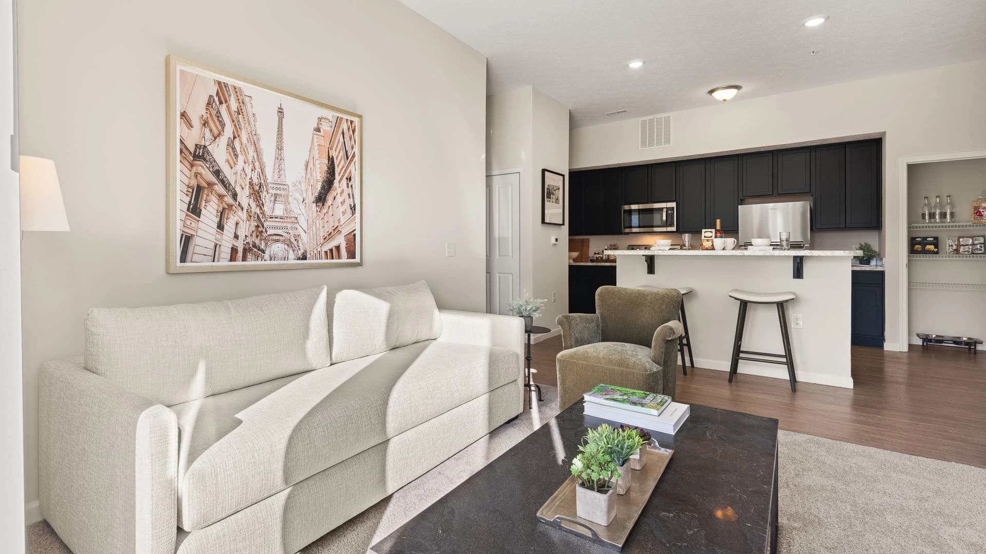 Open floor plan with living room and kitchen in a Grove City apartment unit